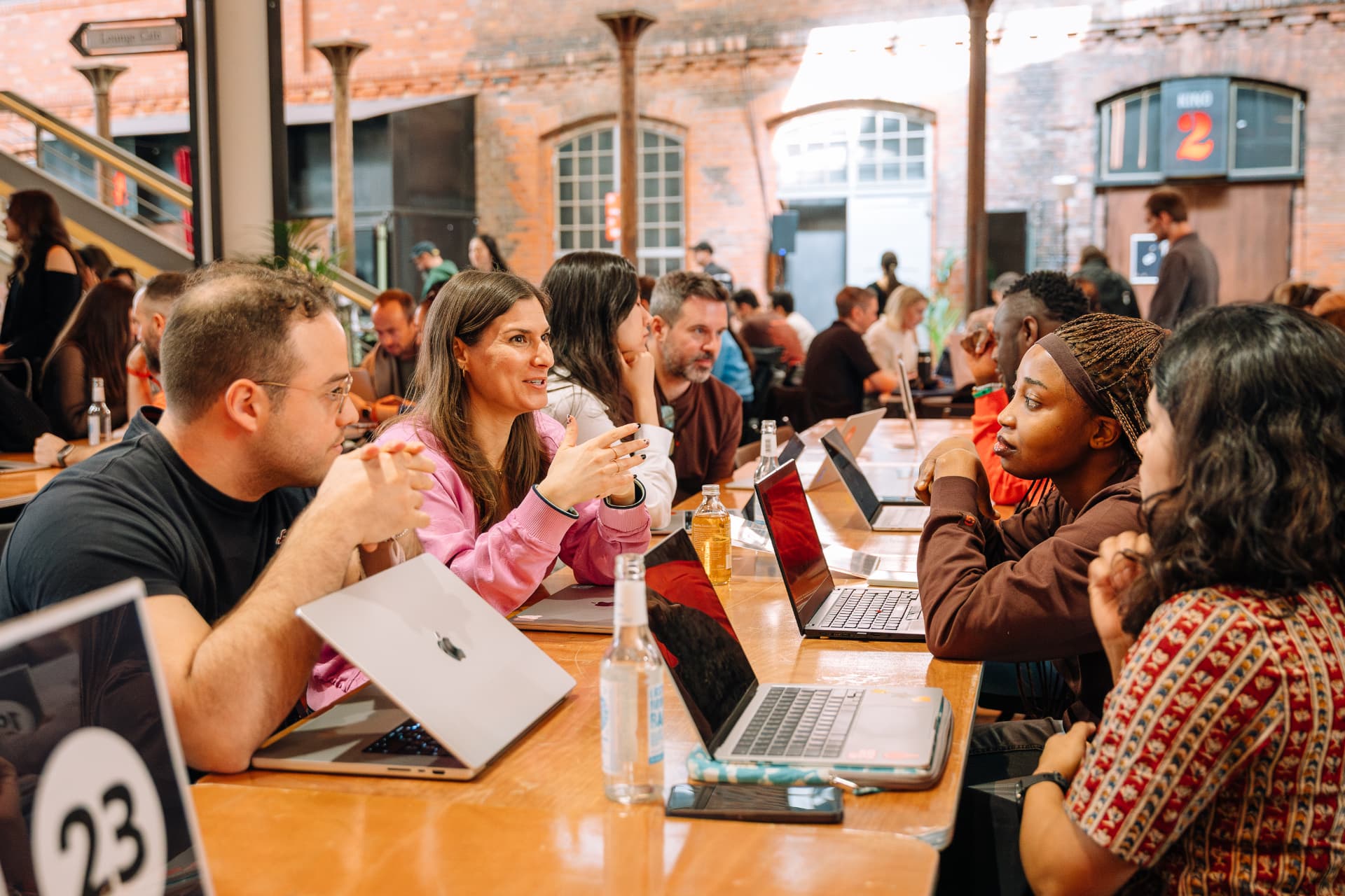 Facilitator running an AI curriculum session with a cohort